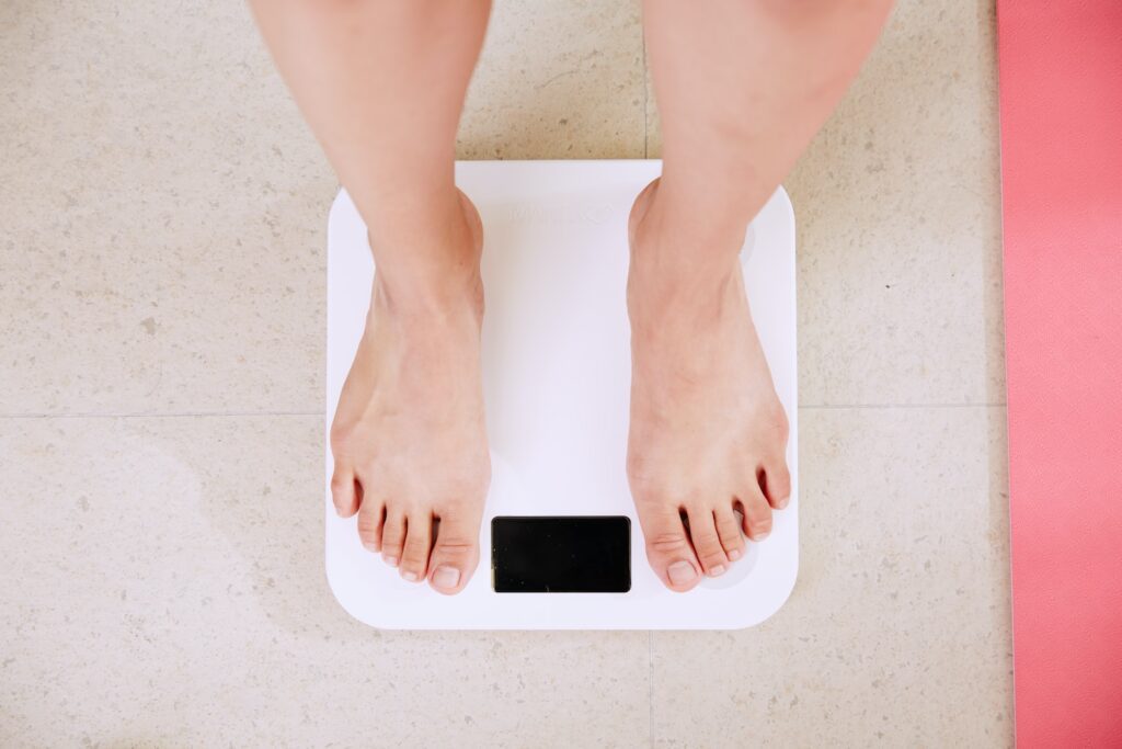Fierce Battle: Coconut Nectar Vs 6 Other Popular Sweeteners 49 person standing on white digital bathroom scale