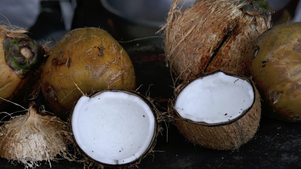 white round ornament on brown wooden round container, In the realm of natural sweeteners, coconut nectar syrup is an increasingly popular choice, praised for its lower glycemic index and rich mineral profile, coconut nectar syrup, raw coconut nectar, coconut nectar drink, best coconut nectar