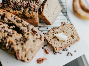brown bread on white ceramic plate, coconut palm sugar, coconut secret coconut nectar, young coconut, dry coconut
