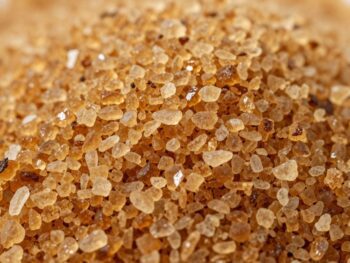 Close-up of granular coconut sugar crystals.
