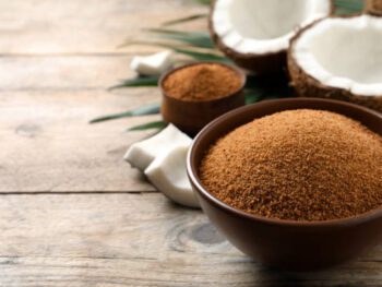 Natural coconut sugar in bowl on wooden table, space for text natural coconut sugar, coconut sugar, coconut sugar, coconut, coconut nectar, coconut flowersweeteners, coconut, glycemic index, coconut sugar, healthy, diet, coconut sugar, natural coconut sugar, coconut powder, sweeteners